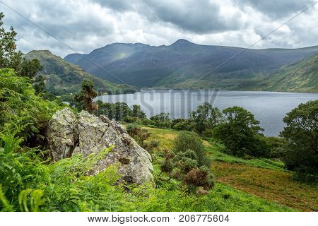 A landscape view of Crummock Water one of the lakes in the Lake District Cumbria United Kingdom.