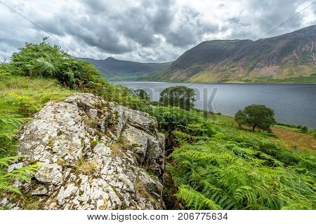 A landscape view of Crummock Water one of the lakes in the Lake District Cumbria United Kingdom.