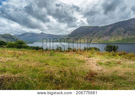 A landscape view of Crummock Water one of the lakes in the Lake District Cumbria United Kingdom.