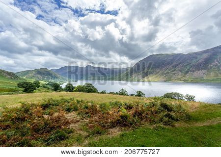 A landscape view of Crummock Water one of the lakes in the Lake District Cumbria United Kingdom.