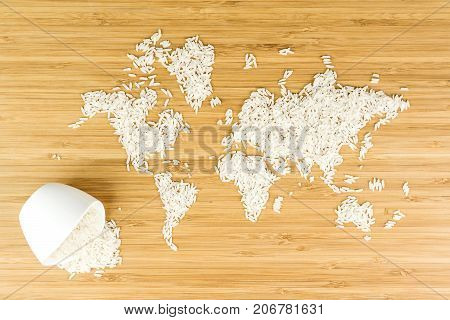 Map Of The World Made Of White Rice With White Ceramic Bowl