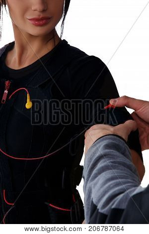 Trainer Helps Attaching Ems