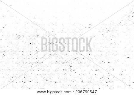 Subtle black halftone vector texture overlay. Monochrome abstract splattered white background. Dotted grain black and white gritty grunge backdrop. Dot and circle dirty effect