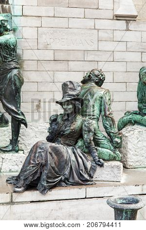 ANTWERPEN, BELGIUM - JUNE 04, 2017: A living statue actress on street in Antwerpen, Belgium
