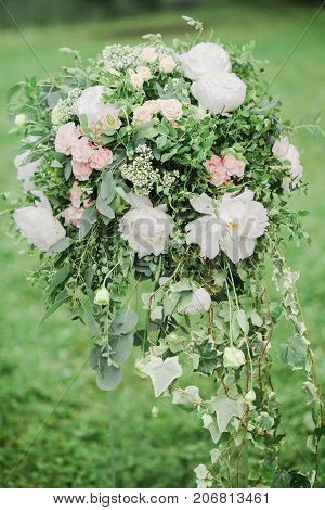 colomn with flowers for werdding ceremony in fine art style