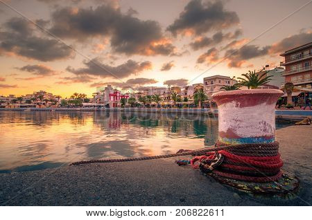 The pictursque port of Sitia, Crete, Greece at sunset. Sitia is a traditional town at the east Crete near the beach of palm trees, Vai.