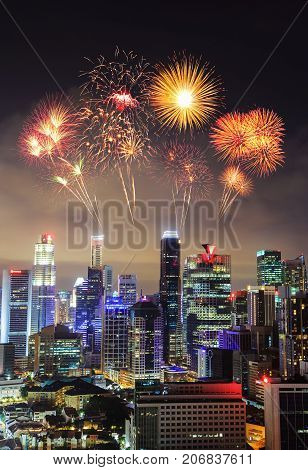 Firework Over Cityscape Of Singapore City At Night