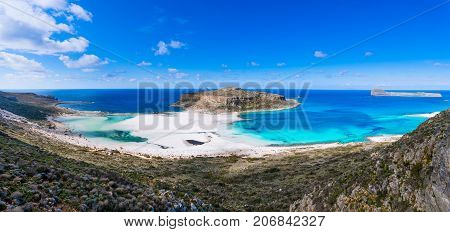 Amazing view of Balos Lagoon with magical turquoise waters, lagoons, tropical beaches of pure white sand and Gramvousa island on Crete, Greece
