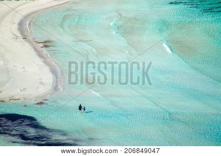 Amazing view of Balos Lagoon with magical turquoise waters, lagoons, tropical beaches of pure white sand and Gramvousa island on Crete, Greece