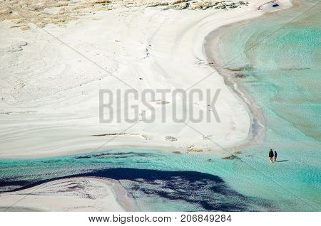Amazing view of Balos Lagoon with magical turquoise waters, lagoons, tropical beaches of pure white sand and Gramvousa island on Crete, Greece