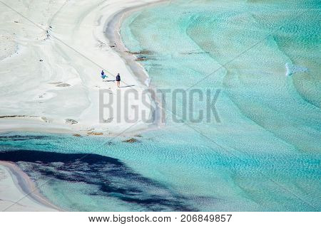 Amazing view of Balos Lagoon with magical turquoise waters, lagoons, tropical beaches of pure white sand and Gramvousa island on Crete, Greece