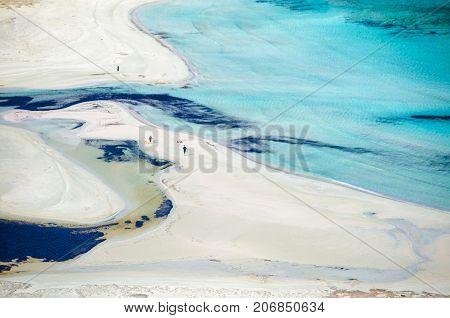 Amazing view of Balos Lagoon with magical turquoise waters, lagoons, tropical beaches of pure white sand and Gramvousa island on Crete, Greece