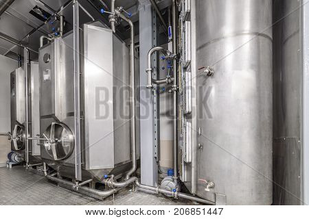 Rectangular steel tank. The system of storage and pumping of liquid.