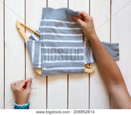 Folding The T-shirt. Keeping Things In The Japanese System. Master Class. Clothes Storage.