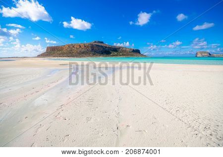 Amazing view of Balos Lagoon with magical turquoise waters, lagoons, tropical beaches of pure white sand and Gramvousa island on Crete, Greece