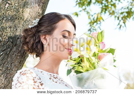 Tender Woman With Bouquet Of Flowers