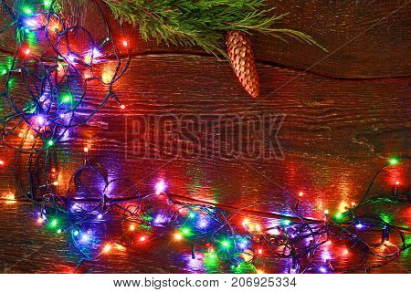 Christmas rustic background - vintage planked wood with lights and free text space.