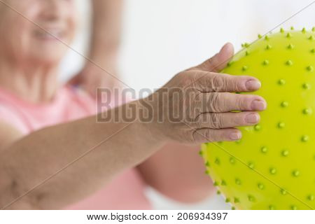Hands Holding Massage Ball