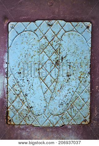 Footprints on the old iron floor. footprints on the old weighing apparatus in the railway station.