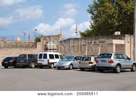 MAJORCA, SPAIN - SEPTEMBER 8, 2017: The exterior of the Plaza de Toros bullring in Alcudia on the Spanish island of Majorca. In 2017 the Balearic islands passed major restrictions on bull fighting.