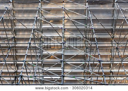 Scaffolding Steel Frame Installation in Construction Site, Scaffold Element Material for Structure Erection., Business Architecture and Construction Industry Under Constructed and Safety First Concept.