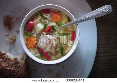 Chicken Noodle Soup With A Spoon In A Bowl Of Cereal Bread