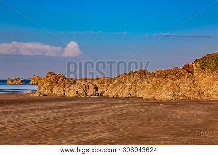 Wild Rocky Beach In Brittany On Armor Coastline.