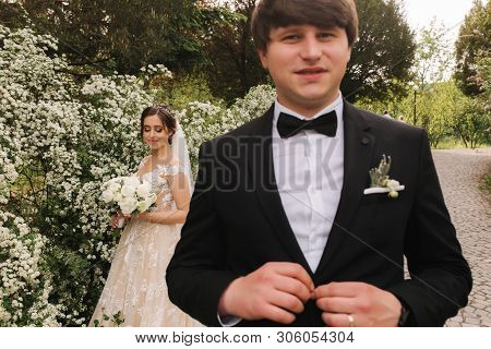 Handsome Groom Staind In Front Of Beutiful Bride