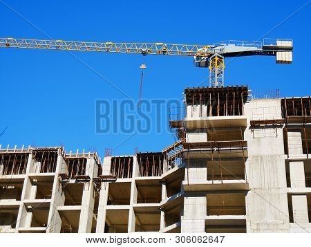 Concrete Building Under Construction. Construction Site Basckground.