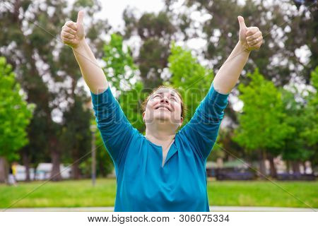Happy Proud Plus Sized Lady Making Like Gesture With Both Hands. Excited Caucasian Woman In Casual R