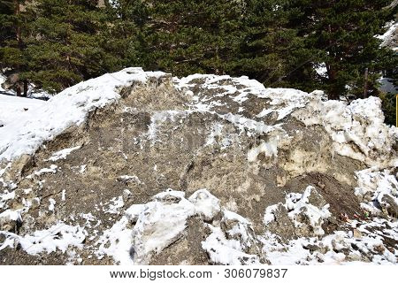 View Of Snow Avalanche In The Rocky Mountains At The Foot Of Mount Elbrus In The Azau Valley In The 