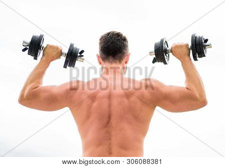 Man Sportsman Weightlifting. Steroids. Fitness And Sport Equipment. Muscular Back Man Exercising In 