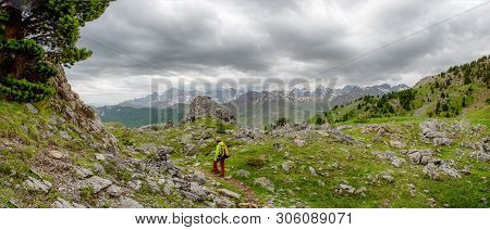 An Hiker Woman With View Of Tena Valley In The Pyrenees, Formigal,  Huesca, Spain