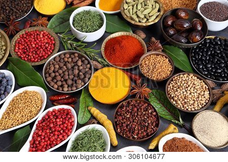 Aromatic Spices And Herbs In Metal And Ceramic Bowls. Top View.