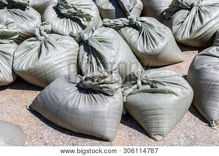 Sandbags For Flood Defense Or Military Use On The City Road