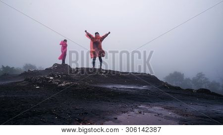 Couples Tourist With Rain Coat Walking Travel Adventure Nature In The Rain Forest. Travel Nature, Tr