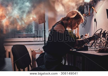 Talanted Young Woman Is Working On Her Own Project At Glass Workshop.