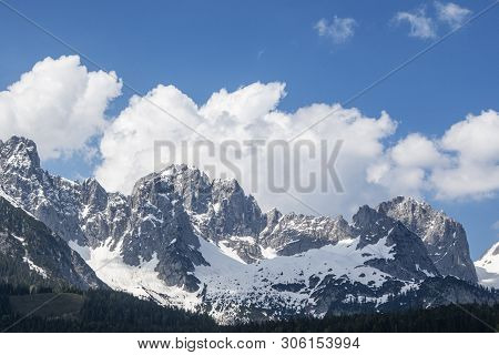 Wilder Kaiser Mountain Range In Austria With Clouds
