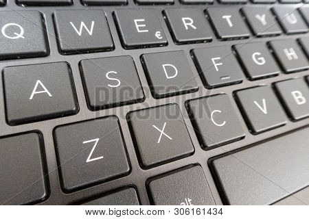 Close-up Detail Of A Qwerty Keyboard Of A Laptop Pc