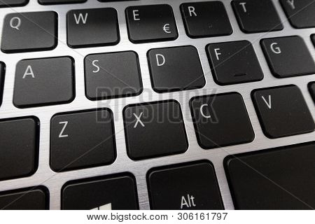 Close-up Detail Of A Qwerty Keyboard Of A Laptop Pc