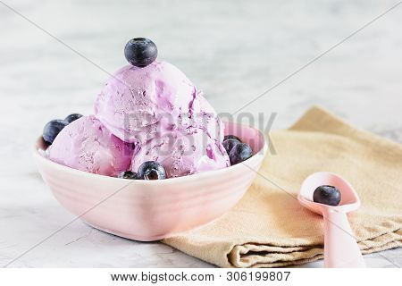 Violet Sweet Ice Cream With Blueberry In Bowl. Three Ball Of Ice-cream With Fruit In Purple Vase. Po