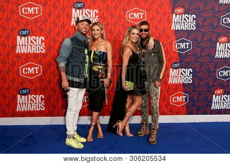 NASHVILLE - JUN 5: (L-R) Chris Lucas, Kaitlyn Lucas, Kristen Brust and Preston Brust attend the 2019 CMT Music Awards at Bridgestone Arena on June 5, 2019 in Nashville, Tennessee.
