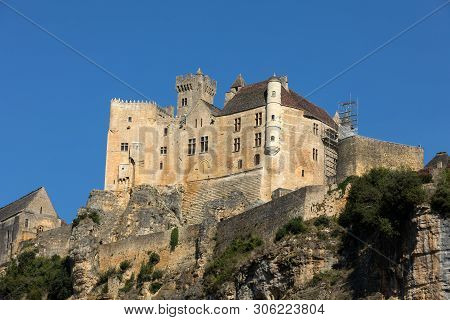 The Medieval Chateau De Beynac Rising On A Limestone Cliff Above The Dordogne River. France, Dordogn