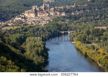 The Medieval Chateau De Beynac Rising On A Limestone Cliff Above The Dordogne River Seen From Castel