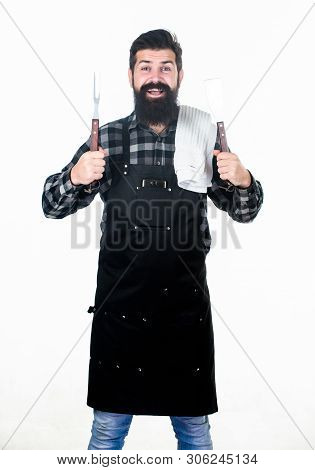 Cooking Meat In Park. Barbecue Master. Bearded Hipster Wear Apron For Barbecue. Roasting And Grillin