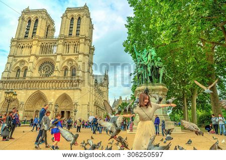 Paris, France - July 2, 2017: Tourist Tour In Near Notre Dame De Paris. Top Paris Attraction. Beauti
