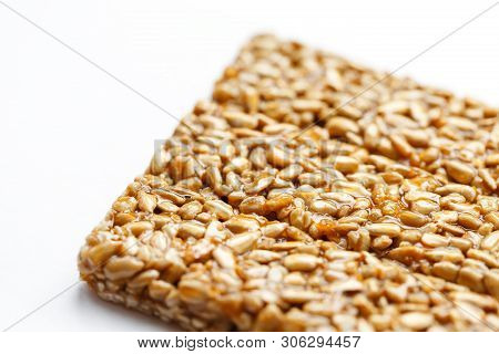 Healthy Snacks. Fitness Diet Food. Kozinaki Fritter, Seeds, Energy Bars. White Background Top View. 