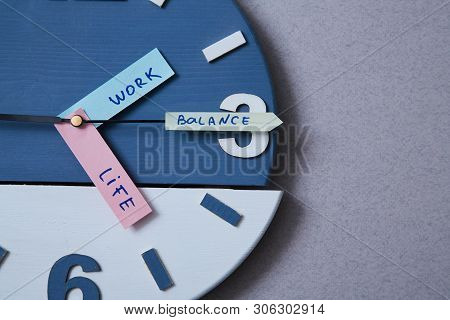 Work Life Balance Choice Concept. Clock Closeup And Arrows Telling