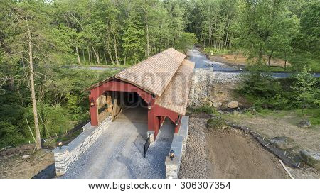 Rebuilt Pennsylvania Dutch Covered Kissing Bridge On A Sunny Day