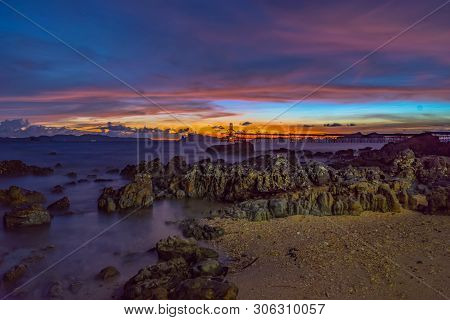Sunset Above Industry Pier At Kwang Beach.there Have Beautiful Rock Along The Beach. Kwang Beach Is 